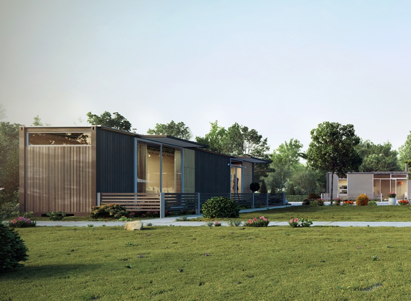 3D rendering of a sustainable urban development. Features eco-friendly modular homes with flat roofs and large windows, surrounded by green lawns, trees, and landscaped gardens. The design emphasizes energy efficiency, natural light, and community-focused living.